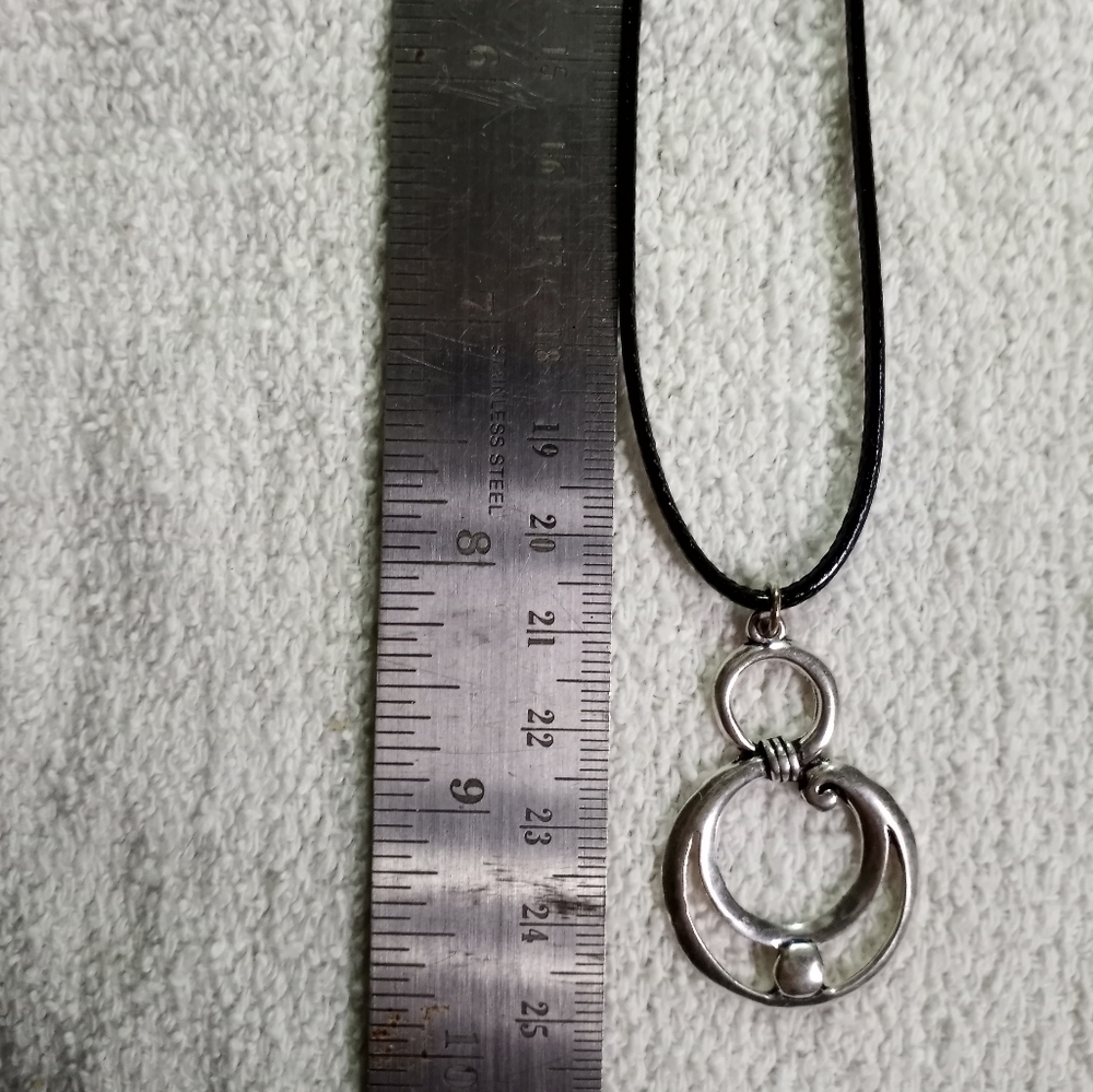 Silvertone swirl necklace on black cord - Picture 2 of 5